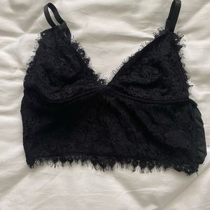 Black going out top with lace detailing size small.